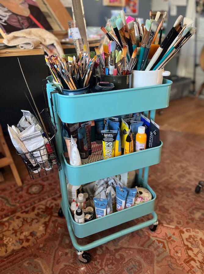 Organizing supplies at the studio
